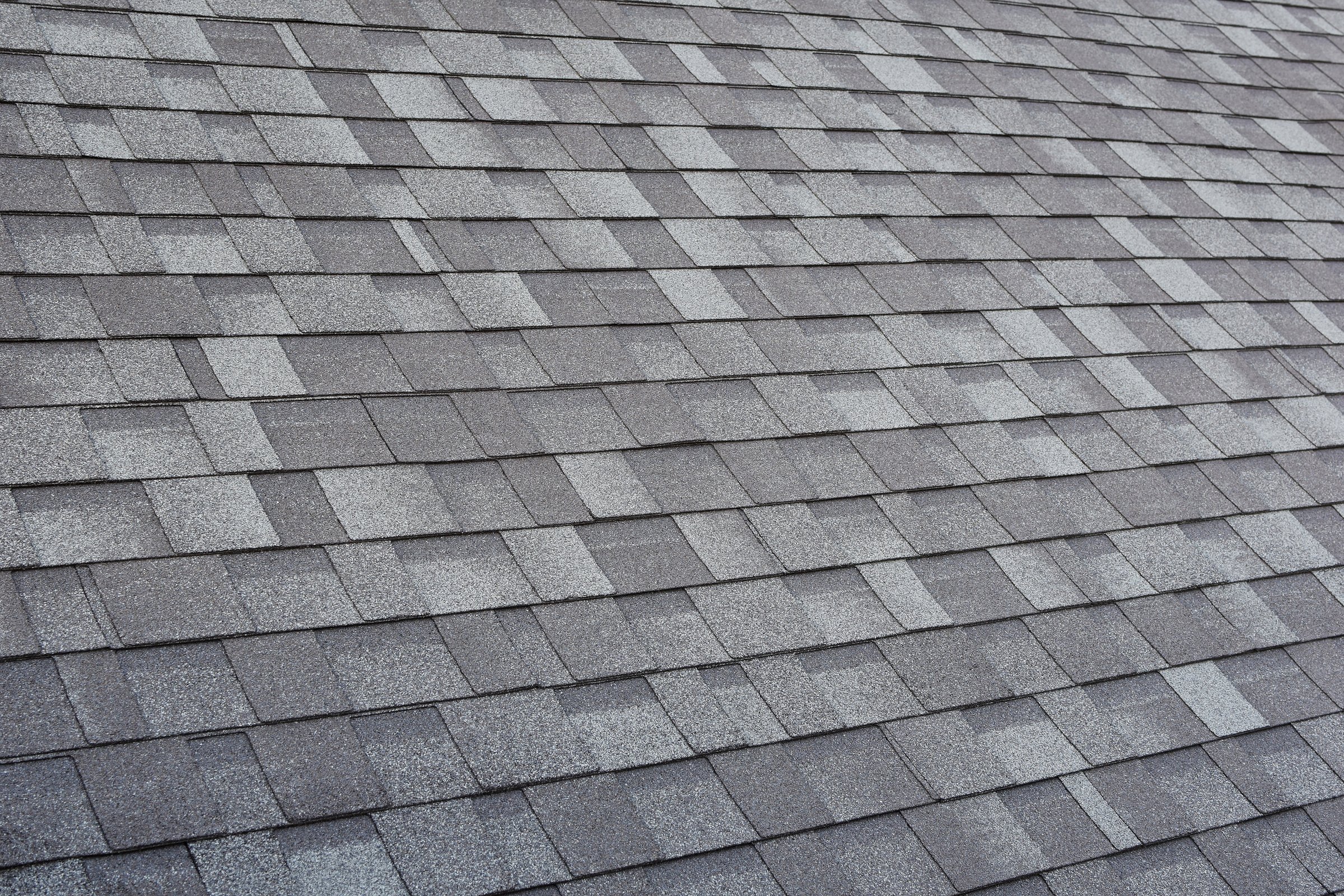 Grey asphalt roof shingles